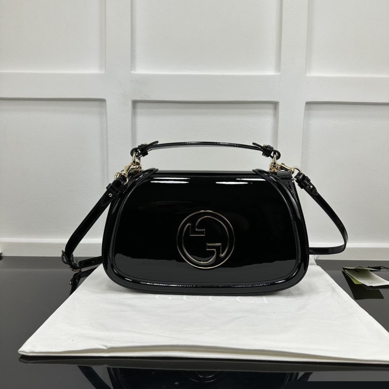 G*u*i top handle bags